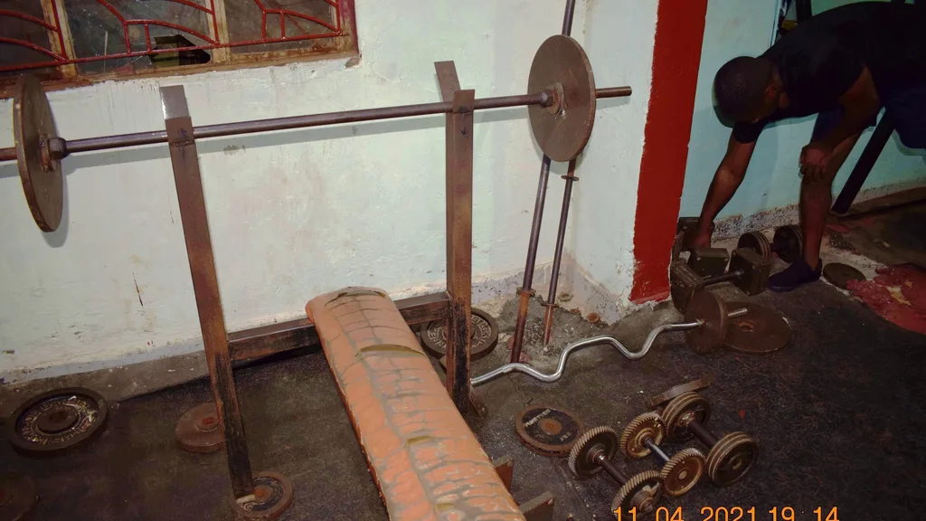 Barbells and dumbbells in a gym