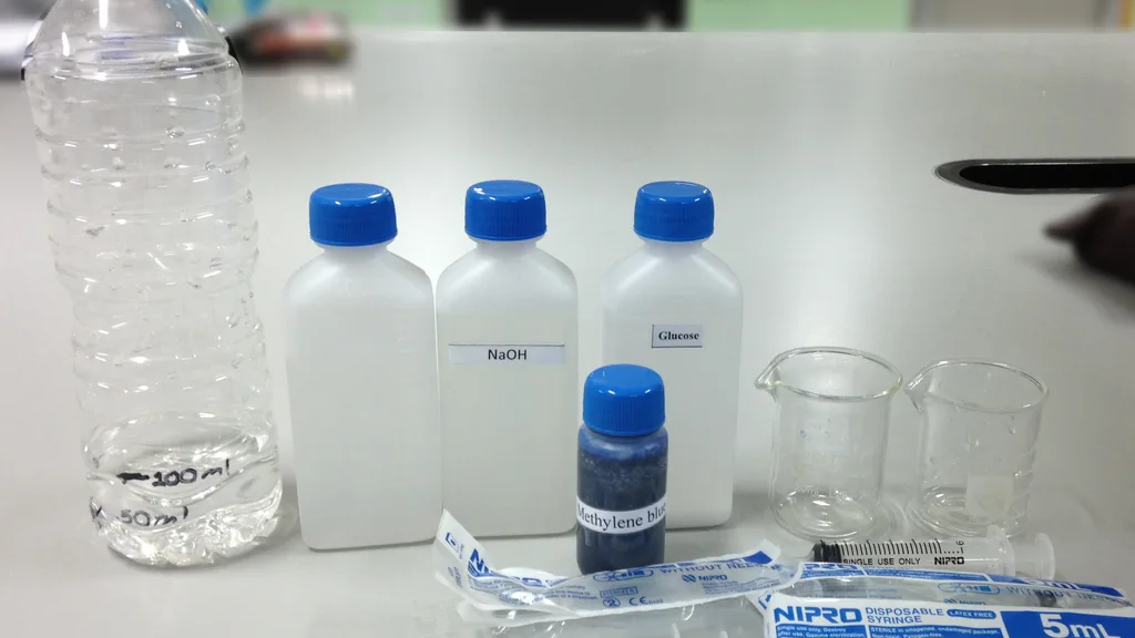 Coloured solution in laboratory glassware